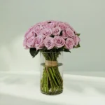 Bunch of Purple Rose in Vase