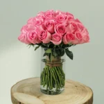 Light Pink Roses in Glass Vase
